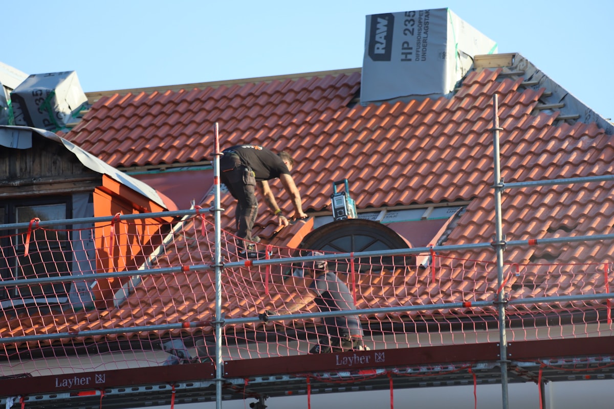 Roof replacement in progress, representing the Ramsey Roofing five-page demo build